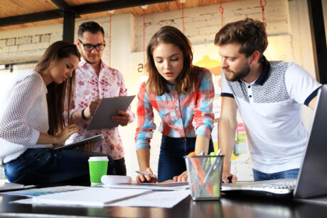 Startup Diversity Teamwork Brainstorming Meeting Concept.Business Team Coworkers Sharing World Economy Report Document Laptop.People Working Planning Start Up.Group Young Hipsters Discussing Cafe